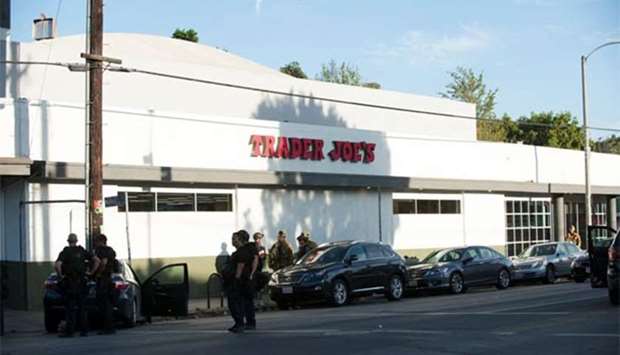 Police respond to a hostage situation at a Trader Joe's store in Los Angeles on Saturday.
