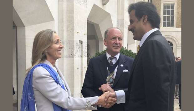 His Highness the Amir Sheikh Tamim bin Hamad al-Thani on Monday with Lord Mayor of the City of London, Alderman Charles Bowman and Minister of State for Trade and Export Promotion Rona Fairhead at London's financial district.