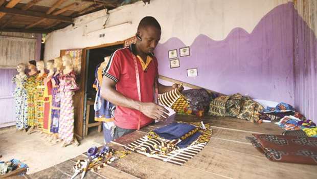 Dressmaker Ibrahim Doumbia in his workshop in Daloa.