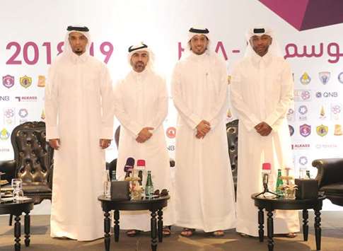 (L to R): Ahmed al-Adsani, QNB Stars League Competitions Director, Hassan Rabia al-Kuwari, Executive Director of Marketing and Communications at QSL, Turki al-Subaie, Technical Head at Al Kass Sports Channel and Mubarak Bilal, representative from the Ministry of Interior, pose during yesterdayu2019s press conference.