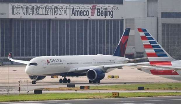 A Delta Airlines Airbus A350 aircraft waits to take off at Beijing airport.