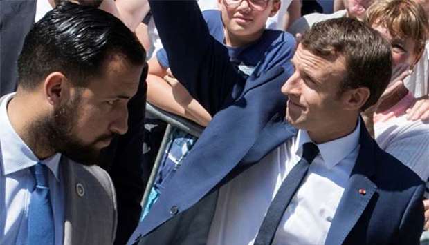 President Emmanuel Macron, flanked by Elysee senior security officer Alexandre Benalla, greets supporters in Le Touquet, France, last year. File picture