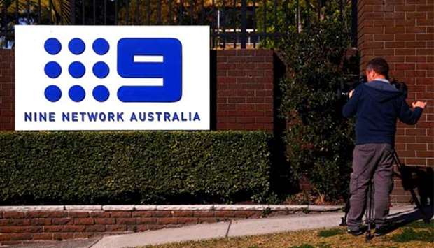 The logo of Nine Entertainment Co Holdings Ltd is on display outside its Sydney headquarters on Thursday.