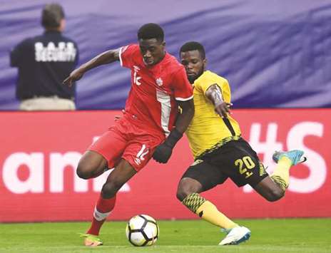 Alphonso Davies (left) will only join Bayernu2019s senior squad in January after seeing out the season with Vancouver. (AFP)