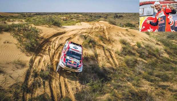 Nasser Saleh al-Attiyah (also inset) and Mathieu Baumel in action during the Silk Way Rally in Russia.