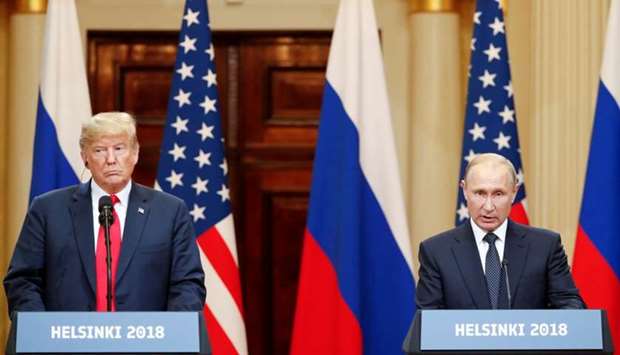 US President Donald Trump and Russian President Vladimir Putin hold a joint news conference after their meeting in Helsinki on July 16, 2018