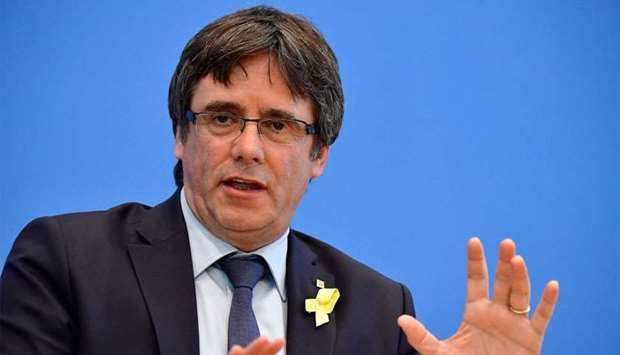 Catalonia's deposed president Carles Puigdemont gives a press conference Wednesday in Berlin