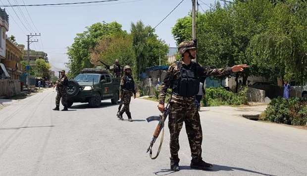 Afghan security forces arrive at an area where explosions and gunshots were heard, in Jalalabad city, Afghanistan