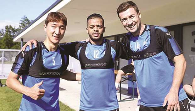 Al Sadd players Jung Woo-young (left), Hamid Ismail (centre) and Gabi Fernandez during the training camp in Austria recently.