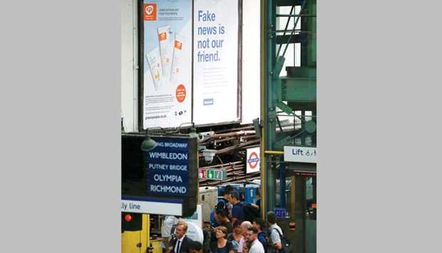 A Facebook billboard advert at Earls Court underground station in London.