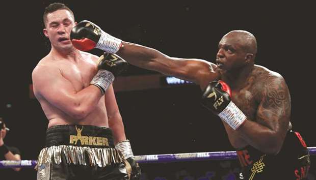Dillian Whyte (right) lands a punch on Joseph Parker during the WBC Silver & WBO International Heavyweight titles bout at the O2 Arena in London, Britain. (Reuters)