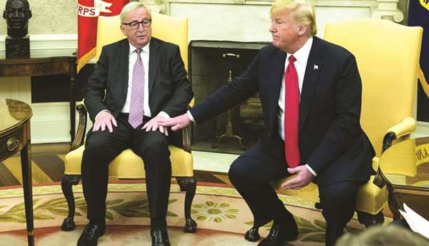 Jean-Claude Juncker, president of the European Commission (left), speaks as US President Donald Trump, listens during a meeting in the Oval Office of the White House in Washington, DC, on July 18. After the meeting, Trump and Juncker said talks would also seek to u201cresolveu201d US tariffs on steel and aluminium and Europeu2019s retaliatory duties.