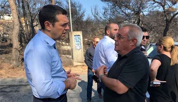Greek Prime Minister Alexis Tsipras visits fire-affected Mati on Monday.