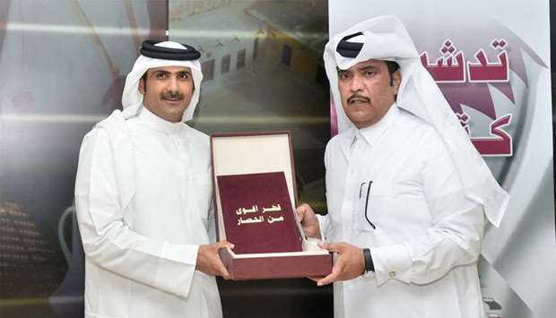 HE Sheikh Abdulrahman bin Hamad al-Thani, CEO of Qatar Media Corporation, and Saleh bin Afsan al-Kuwari, Editor-in- Chief of local Arabic daily Arrayah, at the launch of the book 'Qatar Stronger Than the Blockade'. The book is a compilation of the articles and editorials al-Kuwari has written since June 5 last year when a blockade was unjustly imposed on Qatar by Saudi Arabia, UAE, Bahrain and Egypt.