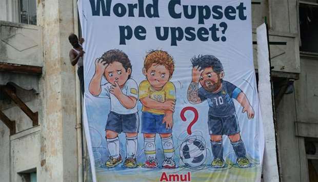 An Amul dairy products billboard on the side of a building in Mumbai.