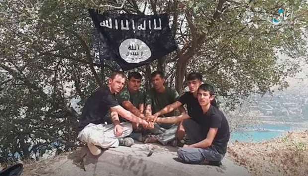 An image taken from a video released by the Islamic State's Amaq News Agency on Tuesday allegedly shows the five executors of an attack on foreign tourists on a bike tour in southern Tajikistan.