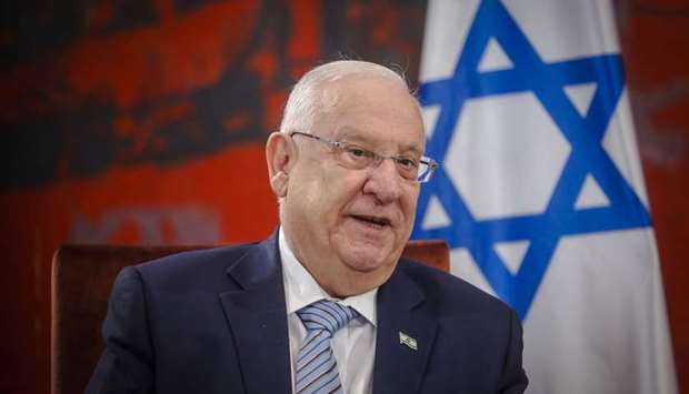 President Reuven Rivlin has reportedly said he will sign the law in Arabic, in an apparent protest against the language's loss of official status alongside Hebrew under the legislation