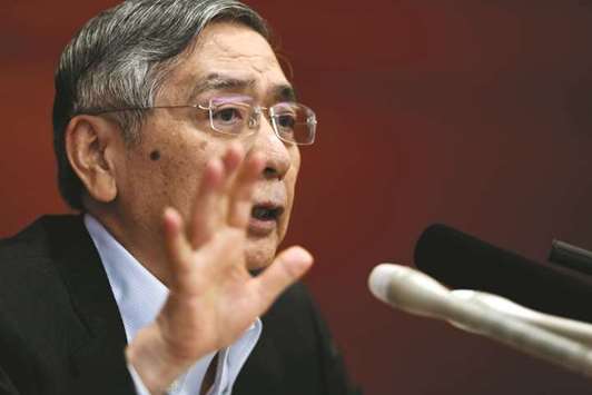Bank of Japan governor Haruhiko Kuroda speaks during a press conference in Tokyo yesterday. Japanu2019s central bank revised down inflation forecasts, making only minor tweaks to a monetary policy that has so far fallen short of lifting prices and boosting the worldu2019s third-largest economy.
