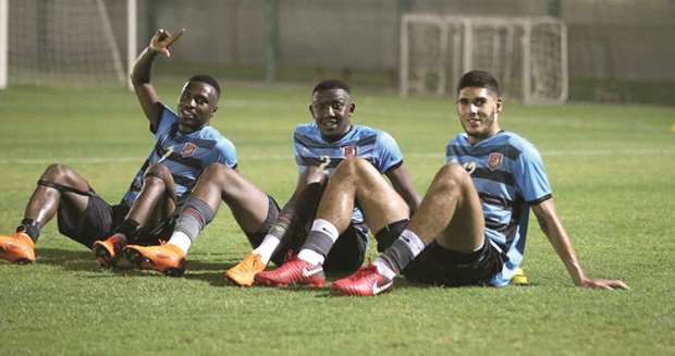 Al Duhail player Karim Boudiaf (right) takes part in a training session with teammates ahead of their Sheikh Jassim Cup clash against Al Rayyan.
