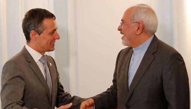 Swiss Foreign Minister Ignazio Cassis with Iranian counterpart Mohammad Javad Zarif