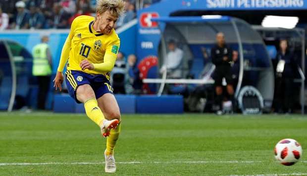Sweden's Emil Forsberg scores their first goal