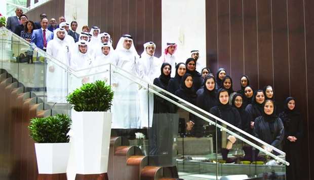 The interns with at the Qatar Airways office.