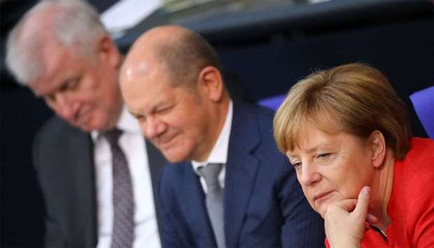 German Chancellor Angela Merkel, Finance Minister Olaf Scholz and German Interior Minister Horst Seehofer