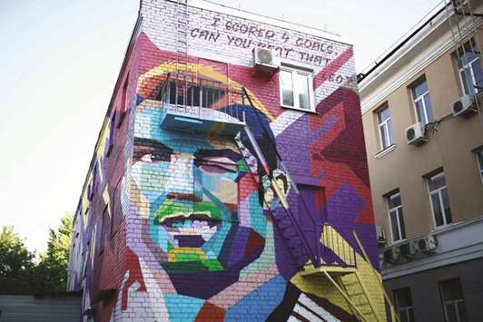 A mural of Portugalu2019s forward Cristiano Ronaldo on a building in Kazan. (AFP)