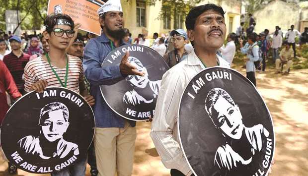 Students and activists holding u2018I am Gauriu2019 placards take part in a rally held in memory of journalist Gauri Lankesh in Bengaluru. Lankesh was shot dead by unidentified assailants.