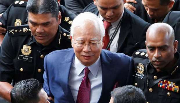 Former Malaysian prime minister Najib Razak arrives in court in Kuala Lumpur