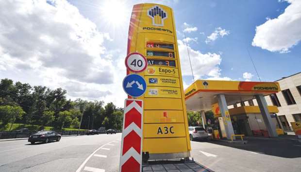 The logo of Russian oil giant Rosneft is seen at a petrol station in Moscow (file). Russian government officials have become increasingly vocal about rising pump prices in recent weeks, mirroring a wave of state intervention in retail fuel that has swept from Latin America to India.