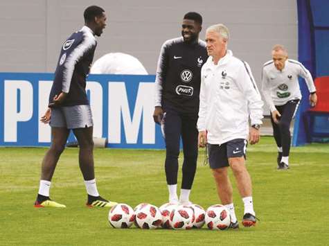 France coach Didier Deschamps (right) with his players during a training session in Istra, Russia. (Reuters)