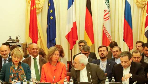 European Union High Representative for Foreign Affairs and Security Policy Federica Mogherini and Iran's Foreign Minister Mohammad Javad Zarif attend a meeting in Vienna.