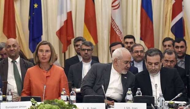 European Union High Representative for Foreign Affairs Federica Mogherini, Iranian Minister of Foreign Affairs Mohammad Javad Zarif and political deputy at the Ministry of Foreign Affairs of Iran Abbas Araghchi take part in a Comprehensive Plan of Action (JCPOA) ministerial meeting on the Iran nuclear deal in Vienna on Friday.