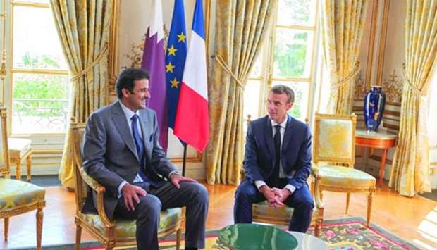 His Highness the Amir Sheikh Tamim bin Hamad al-Thani and French President Emmanuel Macron meeting at the Elysee Palace in Paris on Friday.