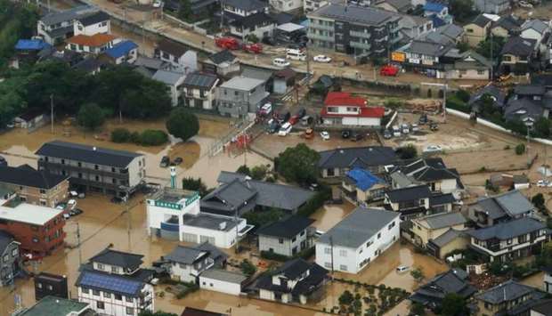An aerial view of flooded houses in Saka Town, Hiroshima prefecture
