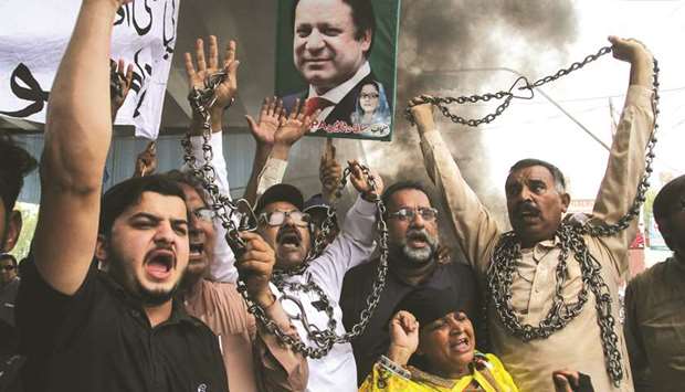 Pakistan Muslim League u2013 Nawaz (PML-N) supporters chant slogans during a protest in Multan.