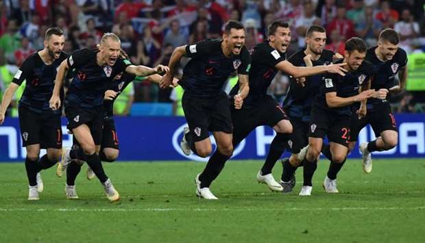 Croatia's players celebrate their winning penalty