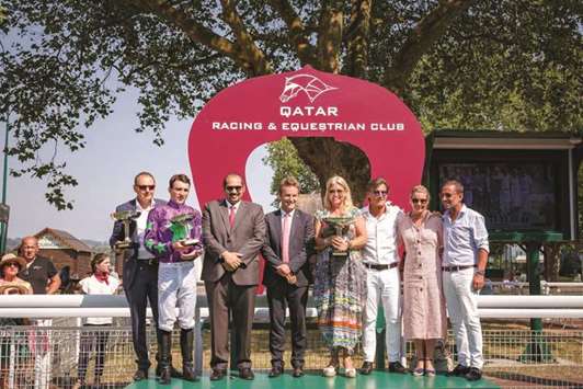 Qatar Racing and Equestrian Club general manager Nasser Sherida al-Kaabi (third from left) with the winners of Qatar Prix Jean Prat after Fabrice Chappet-trained Intellogent won the Group 1 race in Deauville, France, yesterday. PICTURES: Zuzanna Lupa