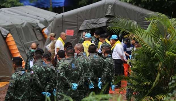 Thai soldiers outside the quarantine tent in Tham Luang cave area where the rescued boys are checked after divers evacuated some of the 12 boys and their coach trapped in the cave.