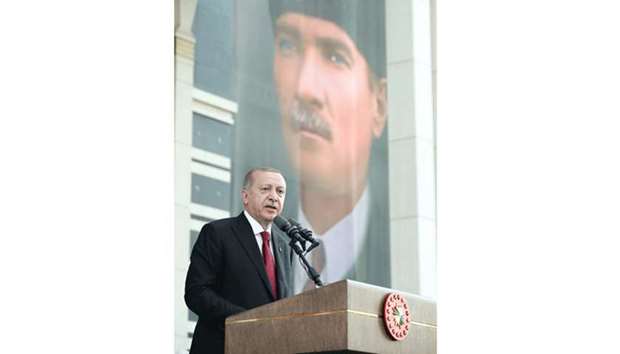 This handout picture taken and released yesterday by the Presidential Office shows Erdogan delivering a speech at the Presidential Complex in Ankara.