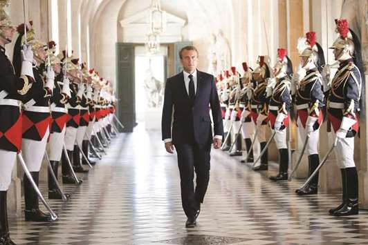 Macron walking through the Galerie des Bustes (Busts Gallery) yesterday to access the Versailles Palaceu2019s hemicycle to address both the upper and lower houses of the French parliament (National Assembly and Senate) at a special session in Versailles.
