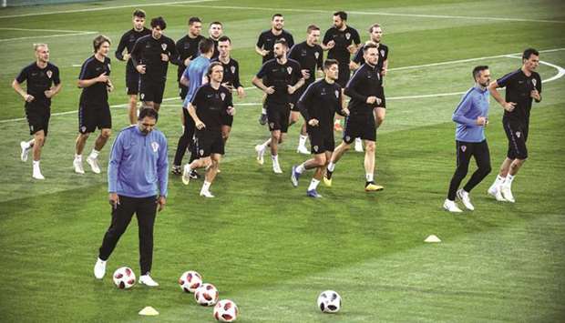 Croatia players take part in a training session at the Luzhniki training field in Moscow yesterday, ahead of their semi-final match against England. (AFP)