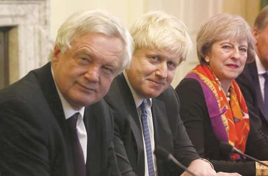 May, David Davis (left)  and Johnson: departures shatter PMu2019s claims of Cabinet unity.