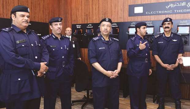 Officials at the Monitoring Centre of the Traffic Directorate headquarters in Madinat Khalifa yesterday.