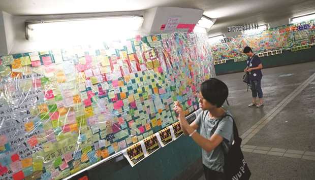 Notes against the proposed extradition bill are seen at Tai Po, in the northern part of the New Territories of Hong Kong, yesterday.