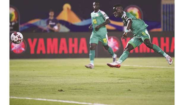 Senegalu2019s Idrissa Gueye scores against Benin during the Africa Cup of Nations quarter-finals in Cairo yesterday. (AFP)