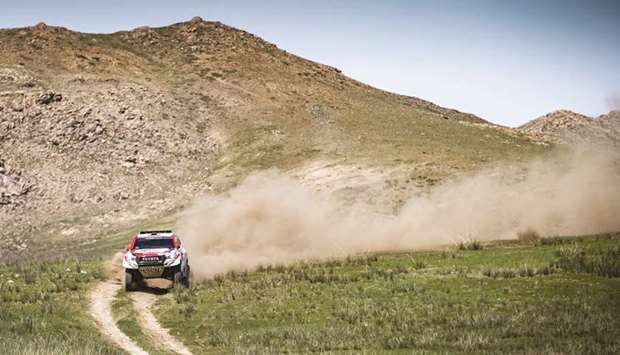 Qataru2019s Nasser al-Attiyah Qataru2019s Nasser al-Attiyah and his French co-driver Mathieu Baumel in action during the fourth stage of Silk Way Rally in Ulaanbaatar, Mongolia yesterday.