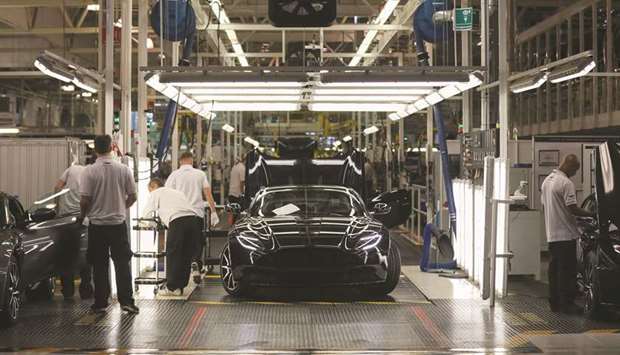An Aston Martin DB11 luxury automobile sits at the end of the final assembly line at Aston Martin Lagonda Ltdu2019s manufacturing and assembly plant in Gaydon, UK.