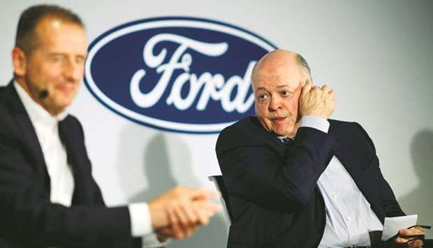 Jim Hackett (right), president and chief executive officer, Ford Motor Company, and Herbert Diess, chief executive officer, Volkswagen Group, attend a press conference in New York City. Volkswagen and Ford are teaming up with a massive $7bn project to attack the new frontier in the global auto market: Electric and self-driving vehicles, the companies announced yesterday.